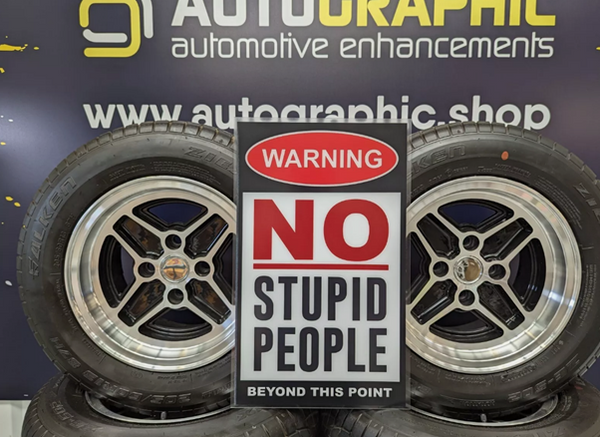 WARNING no stupid people